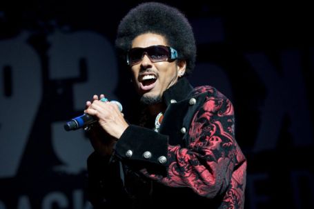 Shock G performing in the stage.